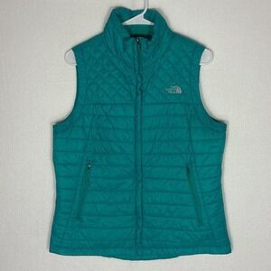The North Face women's blue quilted vest size Lg